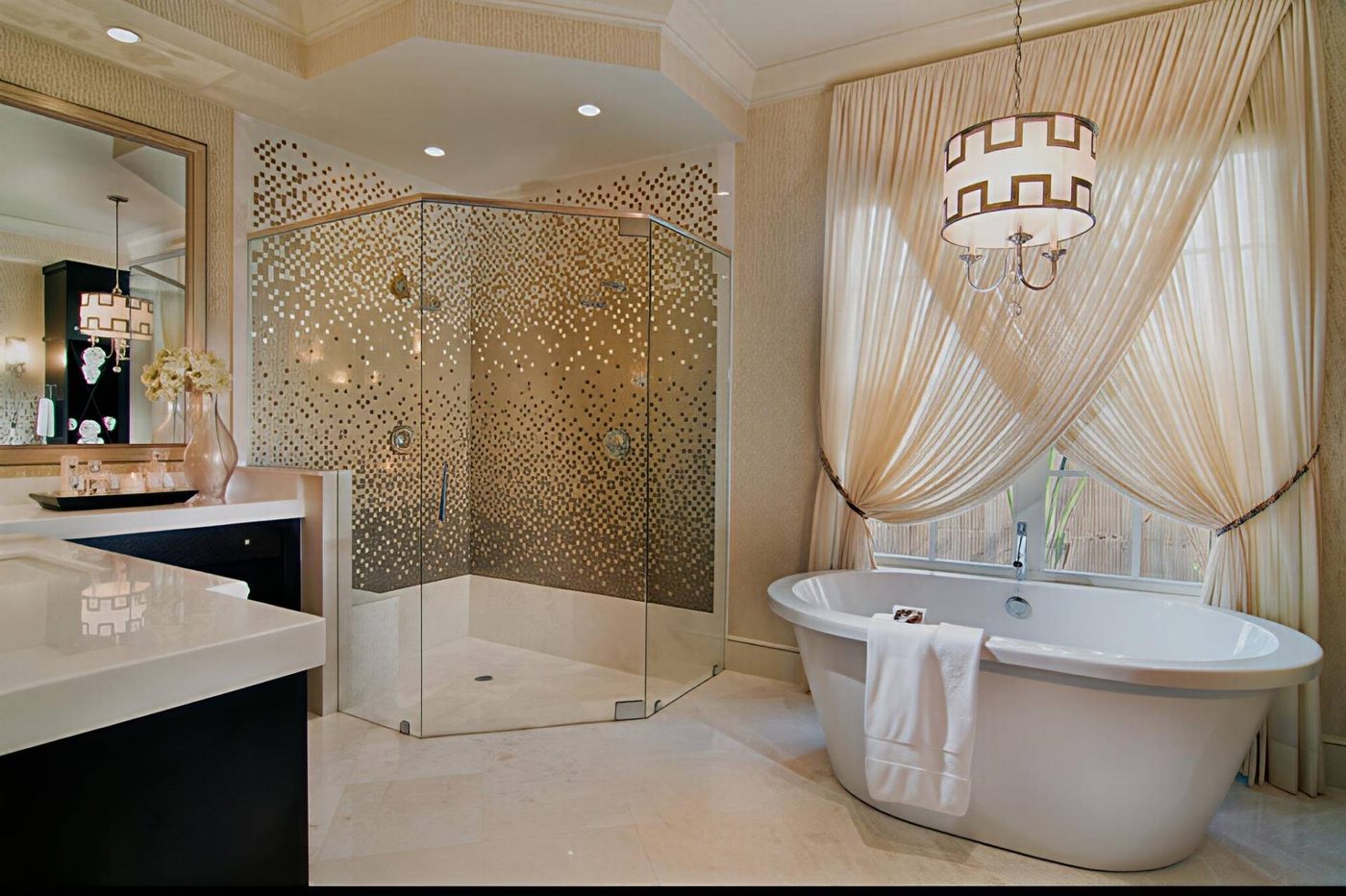Mosaic tile bathroom with a freestanding tub